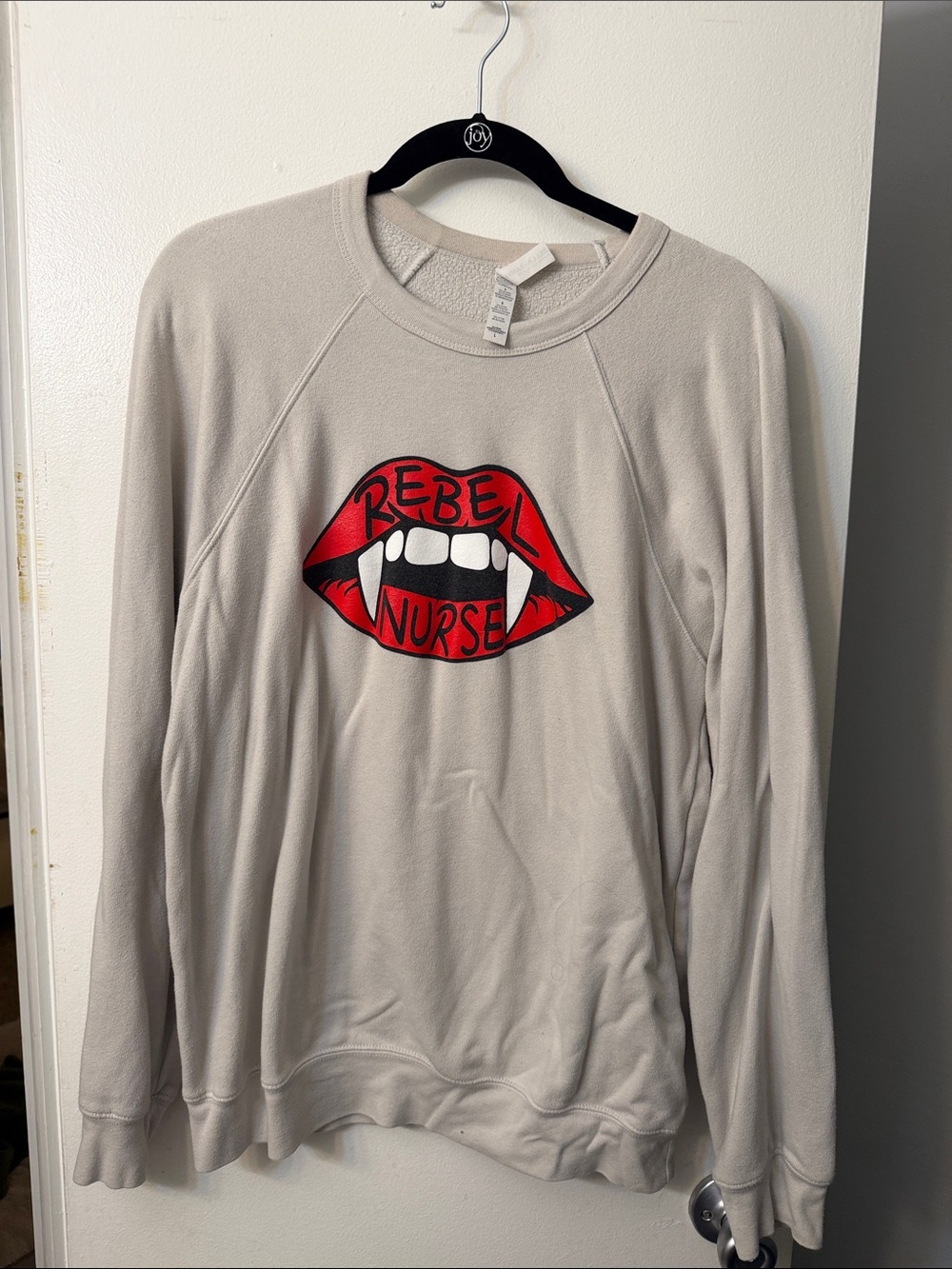 Bella Canvas Cream Sweatshirt with Red Lips 'Rebel Nurse' Graphic